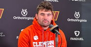 LOOK: Sam Howell wears a Clemson hoodie after losing bet
